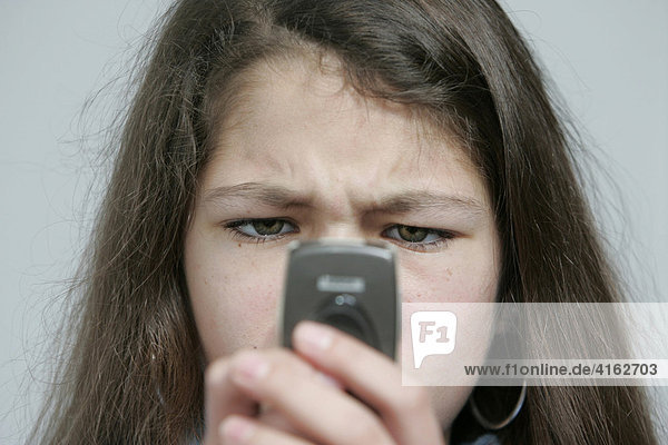 Teenager talking on a mobile phone  Hesse  Germany  Europe