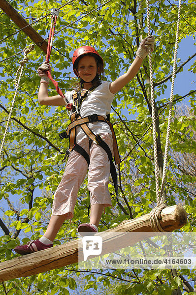 Girl with climbing equipment  Climbing forest Neroberg  Wiesbaden  Hesen  Germany