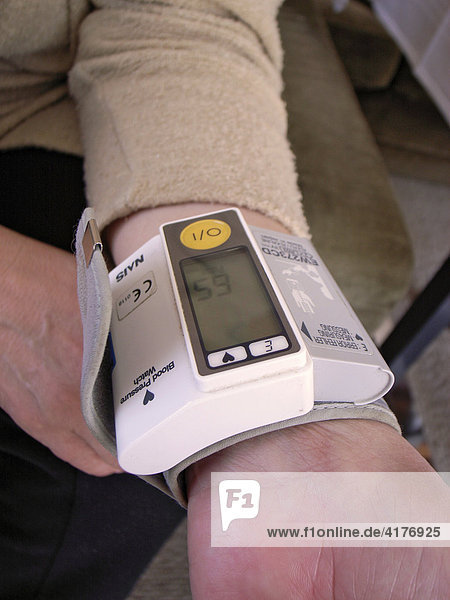 Woman taking the blood pressure