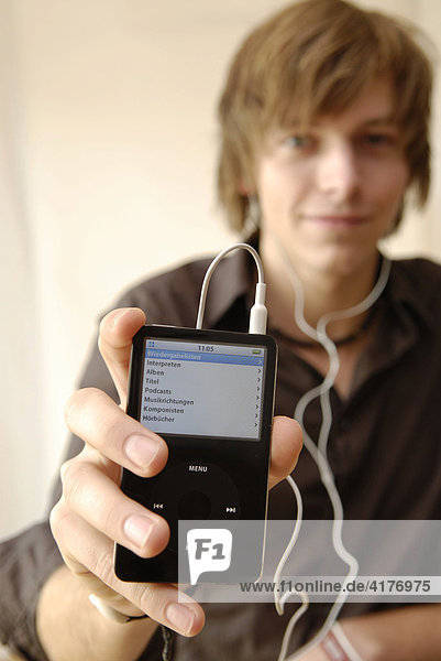 Young man with Apple IPod