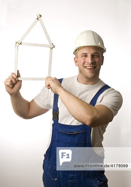 Handwerker/Bauarbeiter mit Zollstock