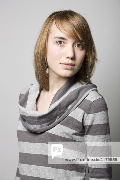 Young woman wearing a striped sweater