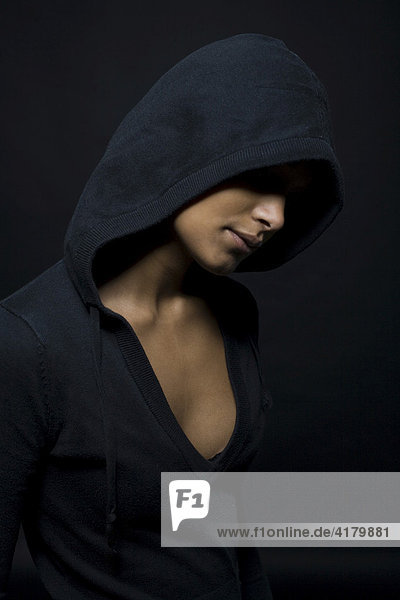 Dark-skinned  hooded woman