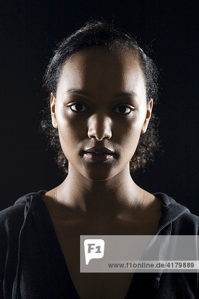 Portrait of a young dark-skinned woman