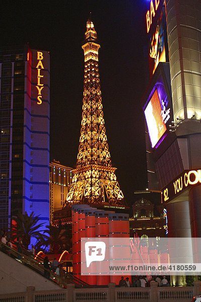 Eiffel Tower and Ballys on Las Vegas Boulevard at night Las Vegas Nevada United States of America USA