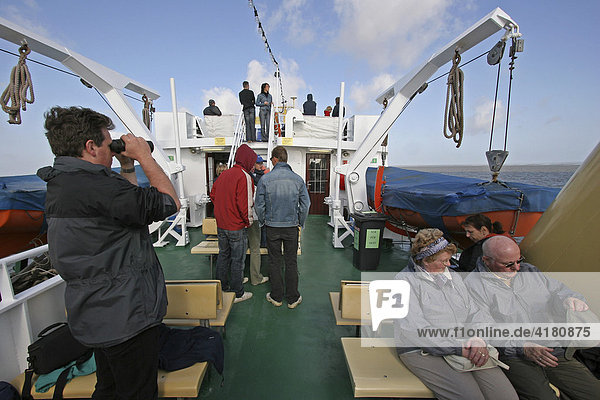 Tourists aboard the ferry SS Lady from Buesum on the way to deep-sea island Heligoland  Schleswig-Holstein  Germany  Europe