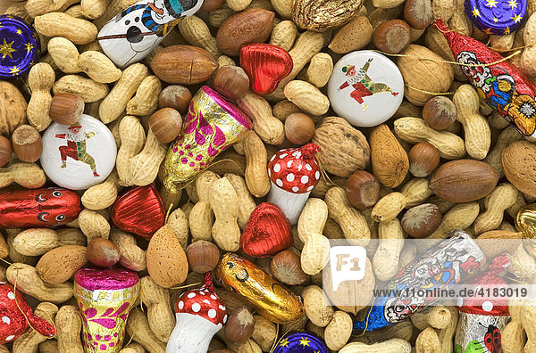 Different sorts of nuts with christmas chocolate