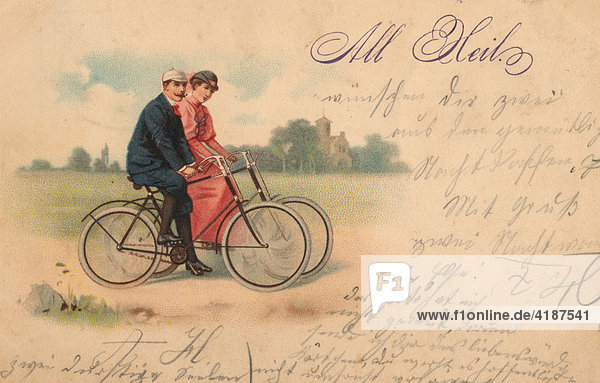 Historic photograph of a couple riding bicycles  old script  taken ca. 1898