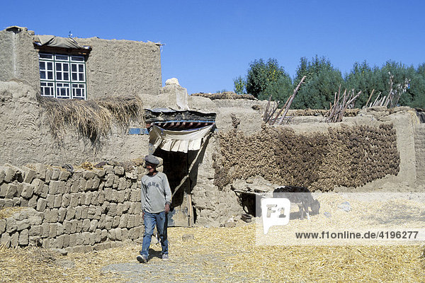 Farmer in front of his house Tibet