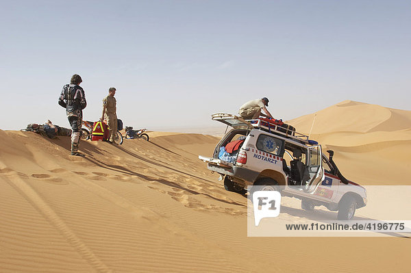 4x4 car Toyota ambulance  rescue of a injured man in the dunes of Lybia