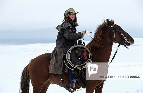 Cowgirl auf Pferd  Kanada
