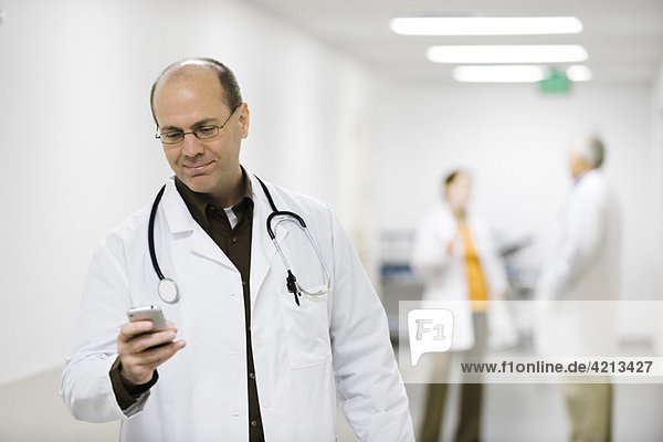 Doctor using cell phone