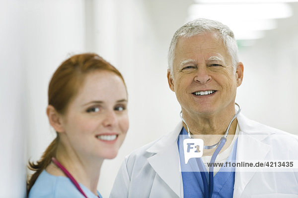 Doctor and nurse smiling  portrait