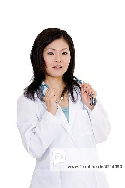 Beautiful Asian woman Doctor/Nurse standing at a desk