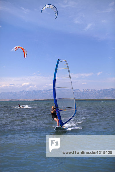 Windsurfer and Kitesurfer