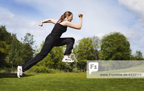 Woman in middle of jump