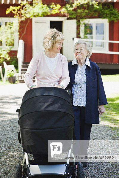 Motjer and daugter with stroller