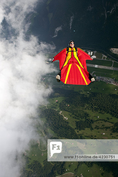 Parachute jumper with wingsuit,  Saanen,  Canton Bern,  Switzerland