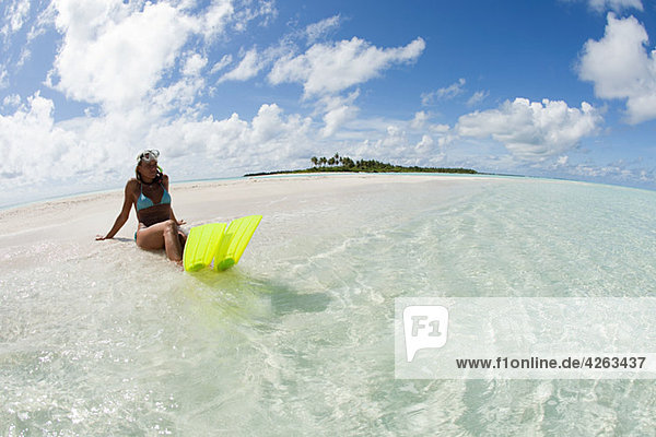 Female snorkeler on Kadhdhoo Island  Laamu Atoll  Maldives