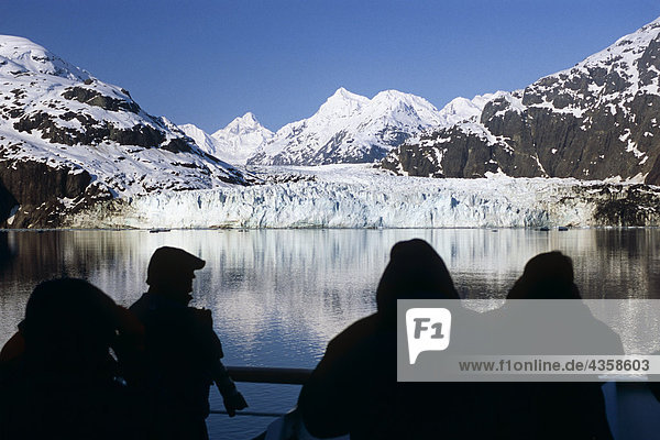 Passengers view Margerie Glacier and Fairweather Mountains on a Cruise West tour in Southeast Alaska during Summer