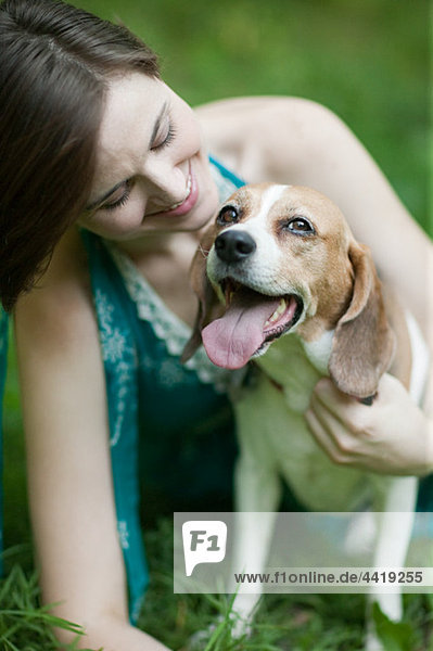 Woman with her pet beagle