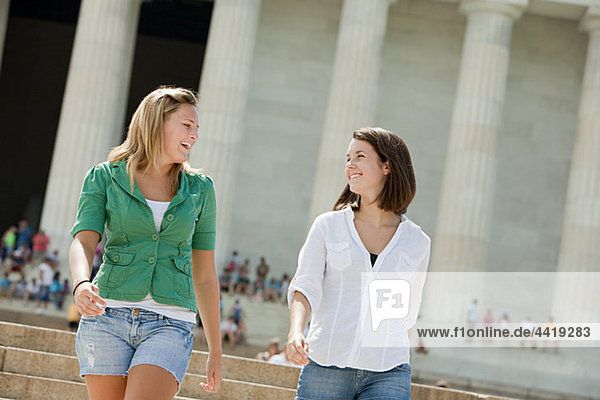 Two girls at lincoln memorial
