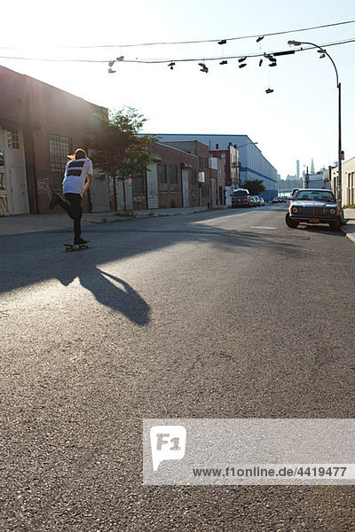 Skateboarder on urban street