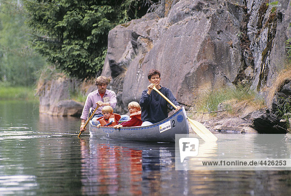 A family in a canoe