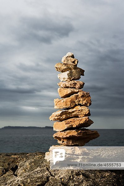 Stacked stones near sea