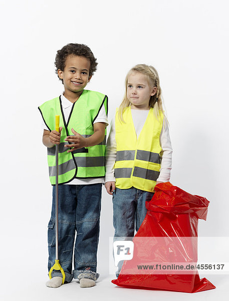 Kids with cleaning gear