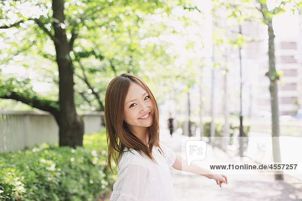 Japanese Teenage Girl in Park