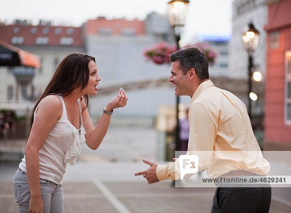 Croatia  Zagreb  Woman and man arguing on street
