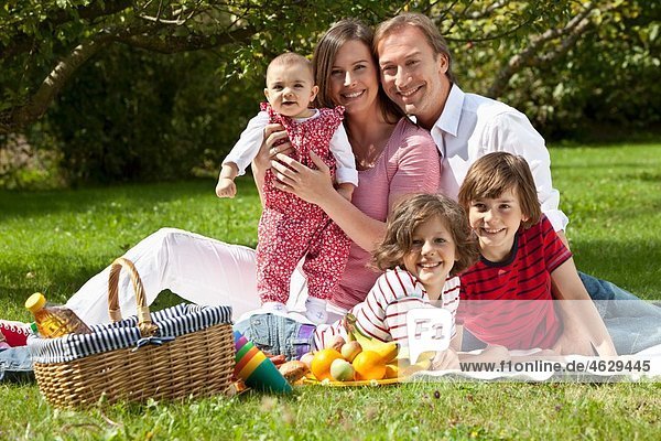 Germany  Bavaria  Family having picnic  portrait