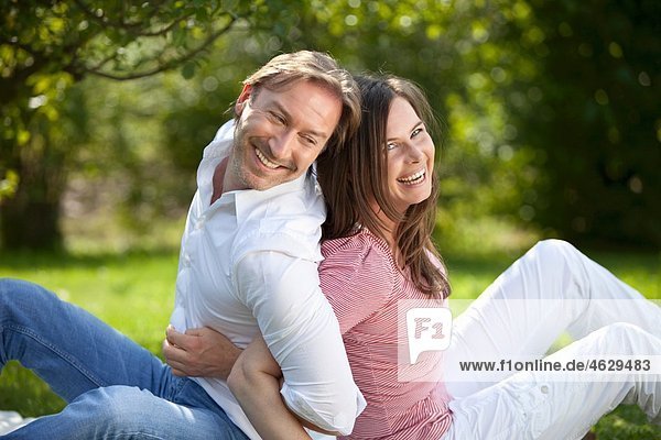Germany  Bavaria  Couple having fun at picnic