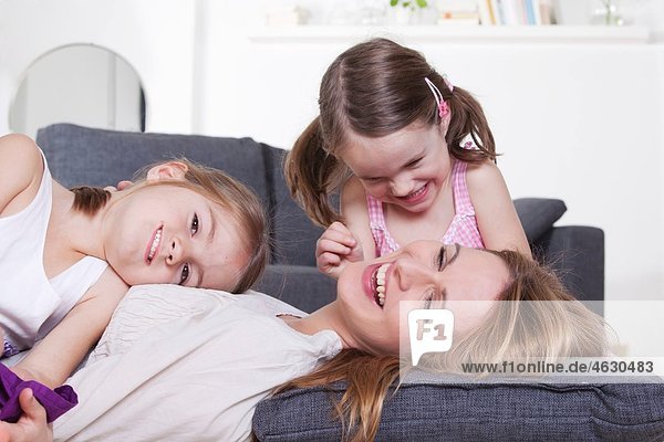 Mother and daughters having fun