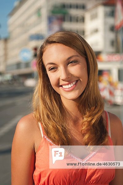 Young woman looking away  smiling