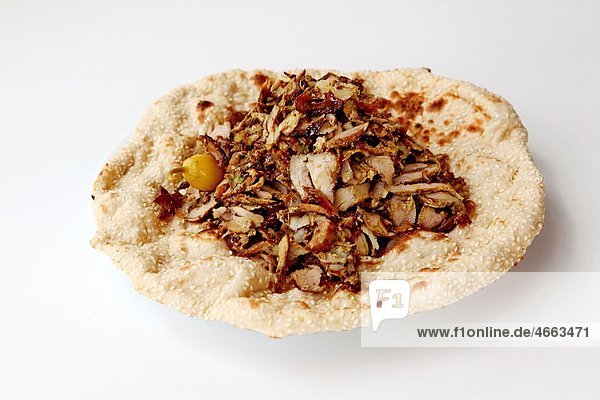 Lamb and turkey shawarma in a Lafa flat Iraqi pita