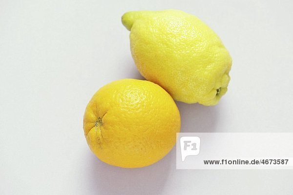A lemon and an orange