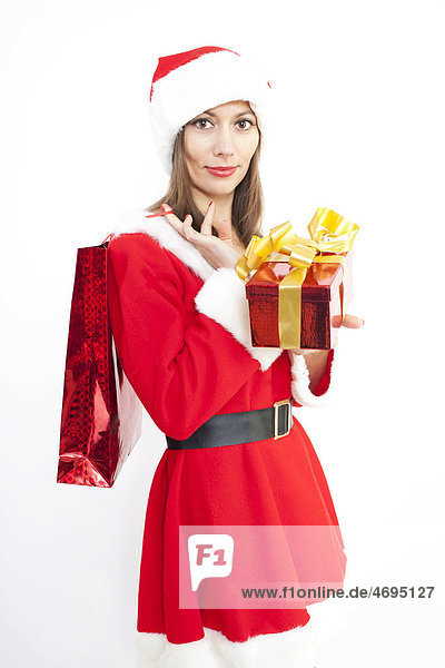 Woman in Christmas costume with gift