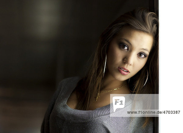 Young woman with a thoughtful expression  portrait