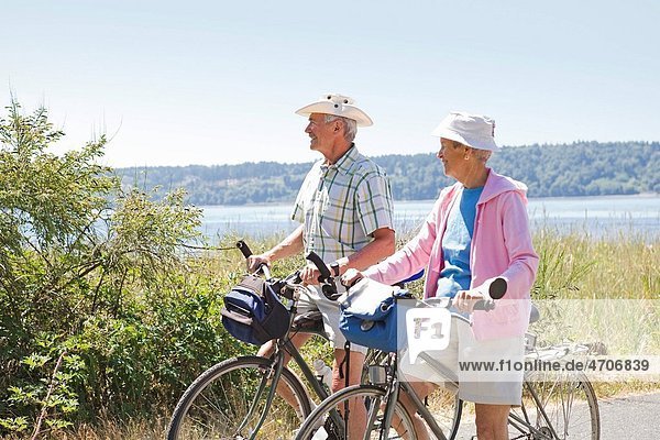 Couple with their bicycles Washington State USA