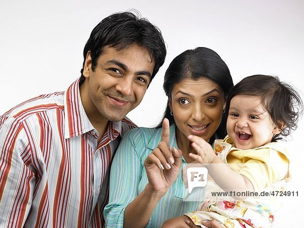 Indian parent with baby girl MR702O 702A 702L