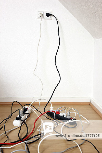 Multiple power strips for connection of multiple electrical devices  tangle of cables  connectors and power supply units