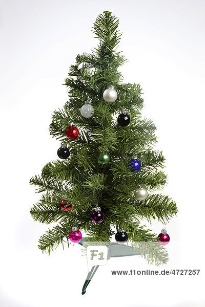 Green plastic Christmas tree  collapsible  with Christmas decoration