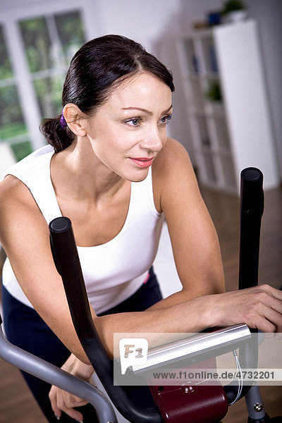 Woman on the elliptical trainer