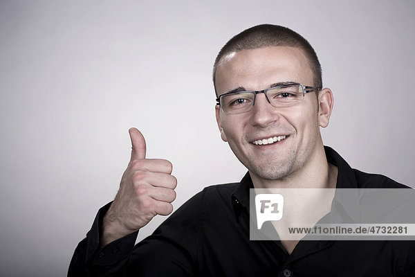 Young man  thumb-up gesture