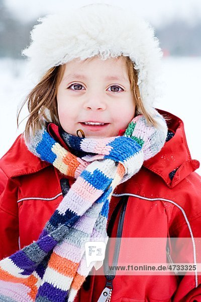 Portrait of girl in winter clothing