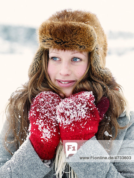 Portrait of woman in fur cap
