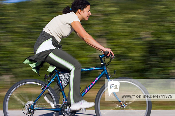 Cyclist  woman riding a bike