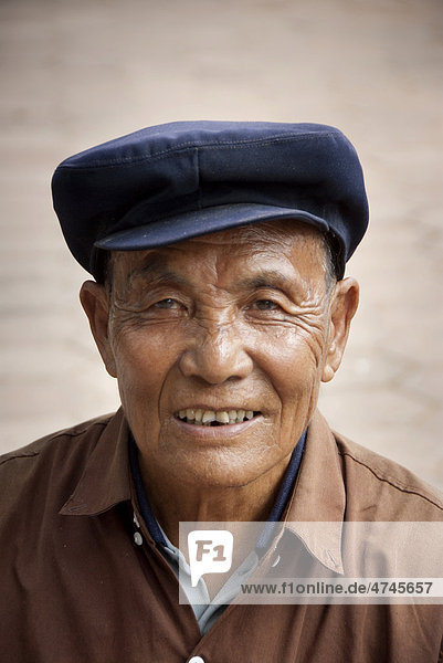 Portrait  Chinese man wearing a Mao cap  Jiangcheng  Pu'er City  Yunnan Province  People's Republic of China  Southeast Asia  Asia